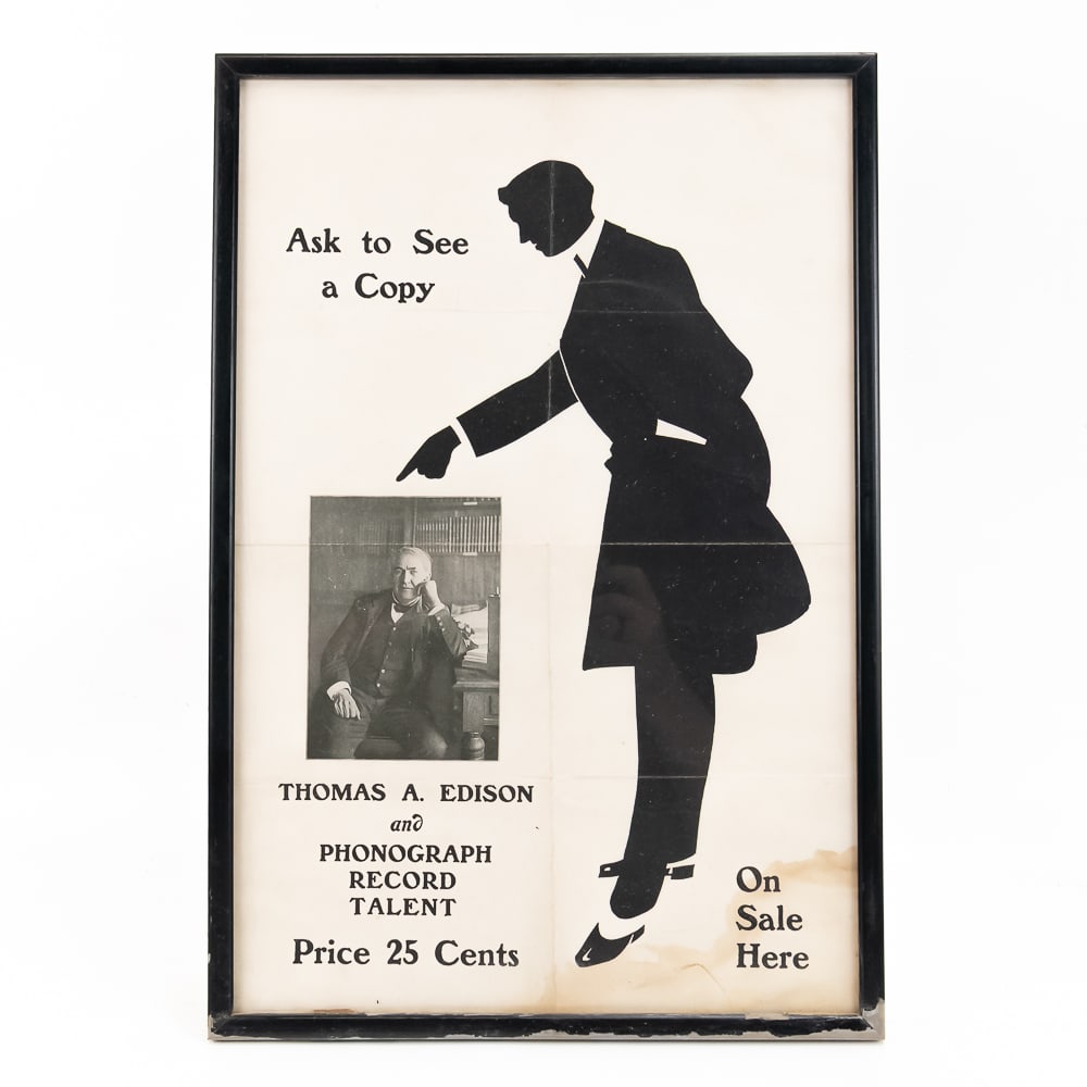 Edison Record Talent Advertisement Poster: Framed under glass black & white poster advertisement for Thomas A. Edison Phonograph Record Talent On Sale Here for 25 cents. Has fold marks and water stain to bottom right corner. Measures 15"