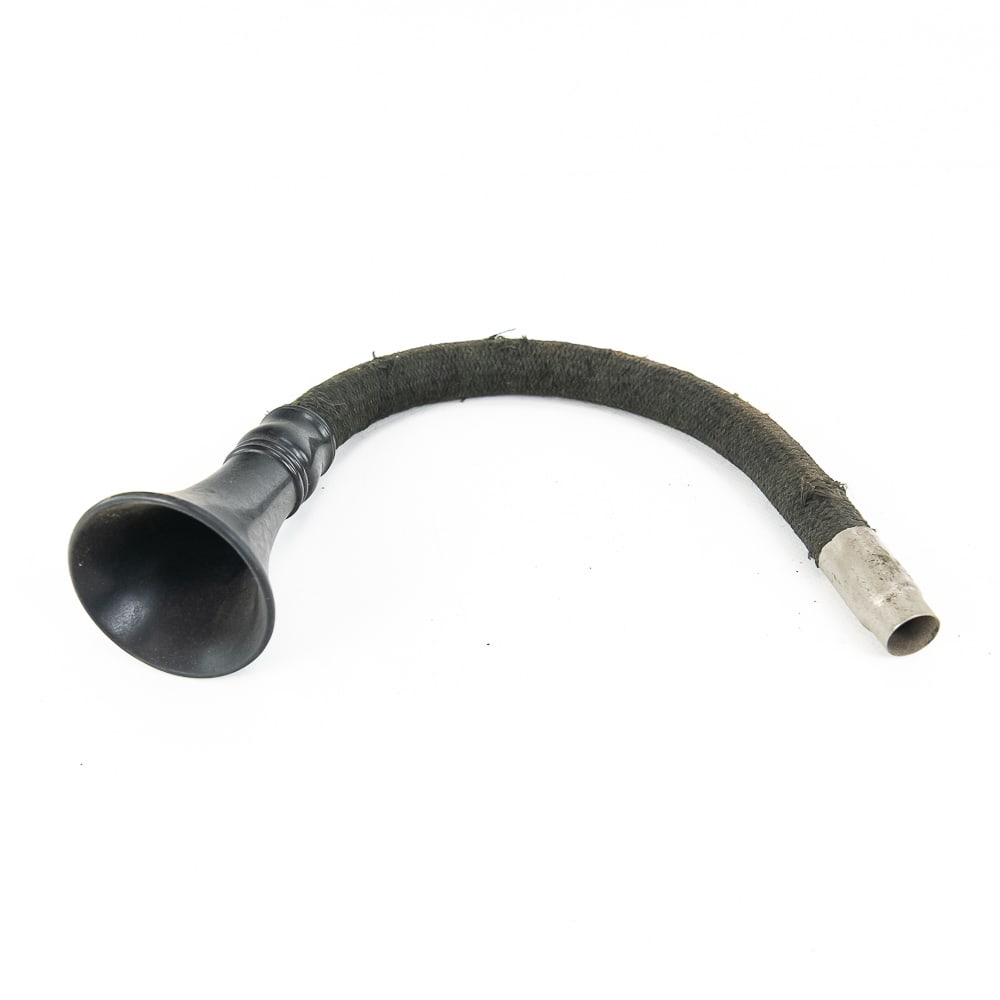 Early Edison Speaking Tube with Flexible Hose: Early original Edison speaking tube. Has its original black phenolic speaking tube as well as a fabric hose with a nickel-plated end. Some fraying in the fabric covering and otherwise usual wear.