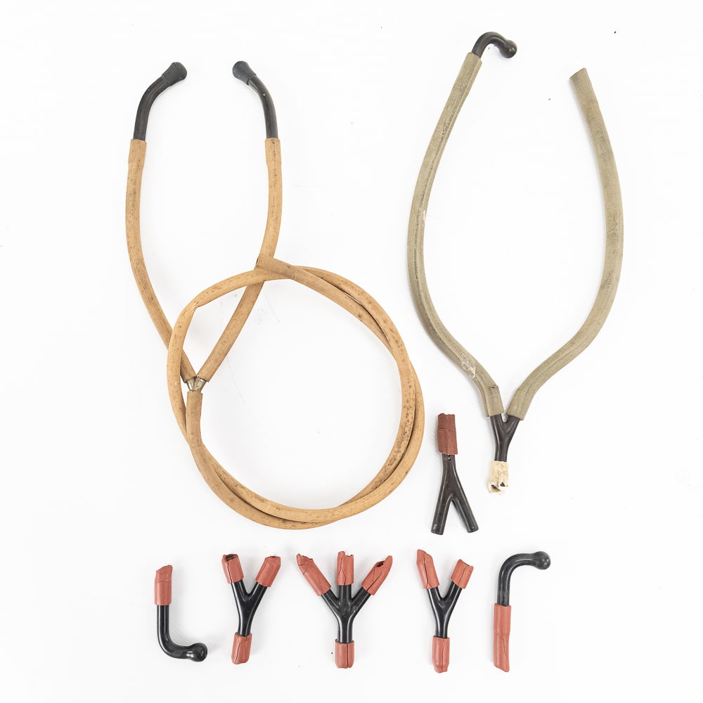 Large Lot of Various Listening Tube Parts: Useful lot consisting of various ear pieces, Y-shaped splitters, three-way splitters, and several lengths of old rubber tubing (which are old and worn with some cracking). See photos for details. Serv