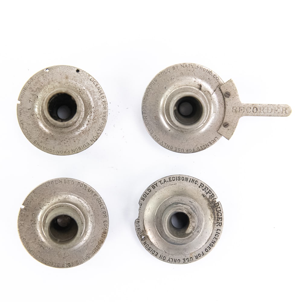 Four-Piece Lot of Edison Recorders for Parts: Edison recorder/reproducer main bodies and weights being sold for parts or restoration. Three have their original weights but are missing all styluses, and one is missing its weight and has some