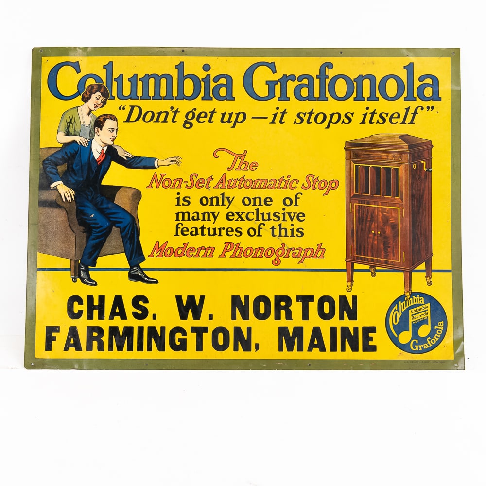 Columbia Grafonola Tin Advertising Sign: Tin litho advertising sign for Columbia Grafonola dealer Chas. W. Norton of Farmington, Maine. In overall VG original condition with a few light scratches. Has mounting holes along the top and