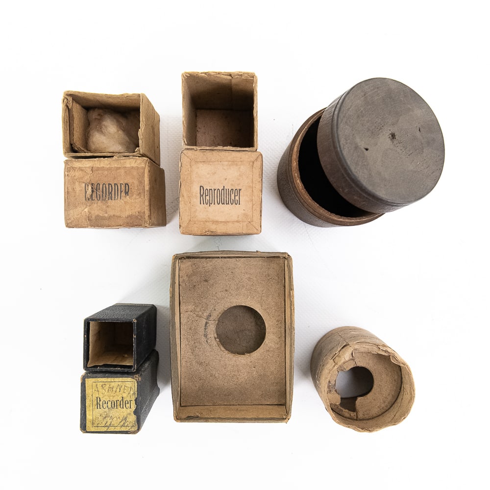 Lot of 7 Cylinder Phonograph Reproducer Boxes: Includes a two-piece wooden round reproducer accessory box, an original two-piece Columbia recorder box, a two-piece Columbia reproducer box, a black two-piece Columbia recorder box, a partial