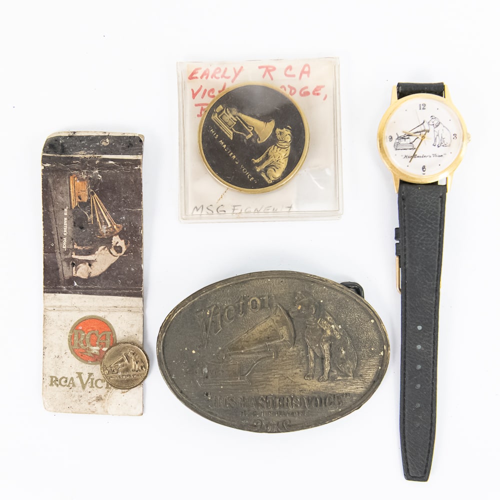 Lot of 4 RCA Gimmick Advertisements: Includes an oval Victor His Master's Voice brass belt buckle, a His Master's Voice wrist watch (modern), a His master's Voice brass badge, and an empty His master's Voice match book. From the Allen
