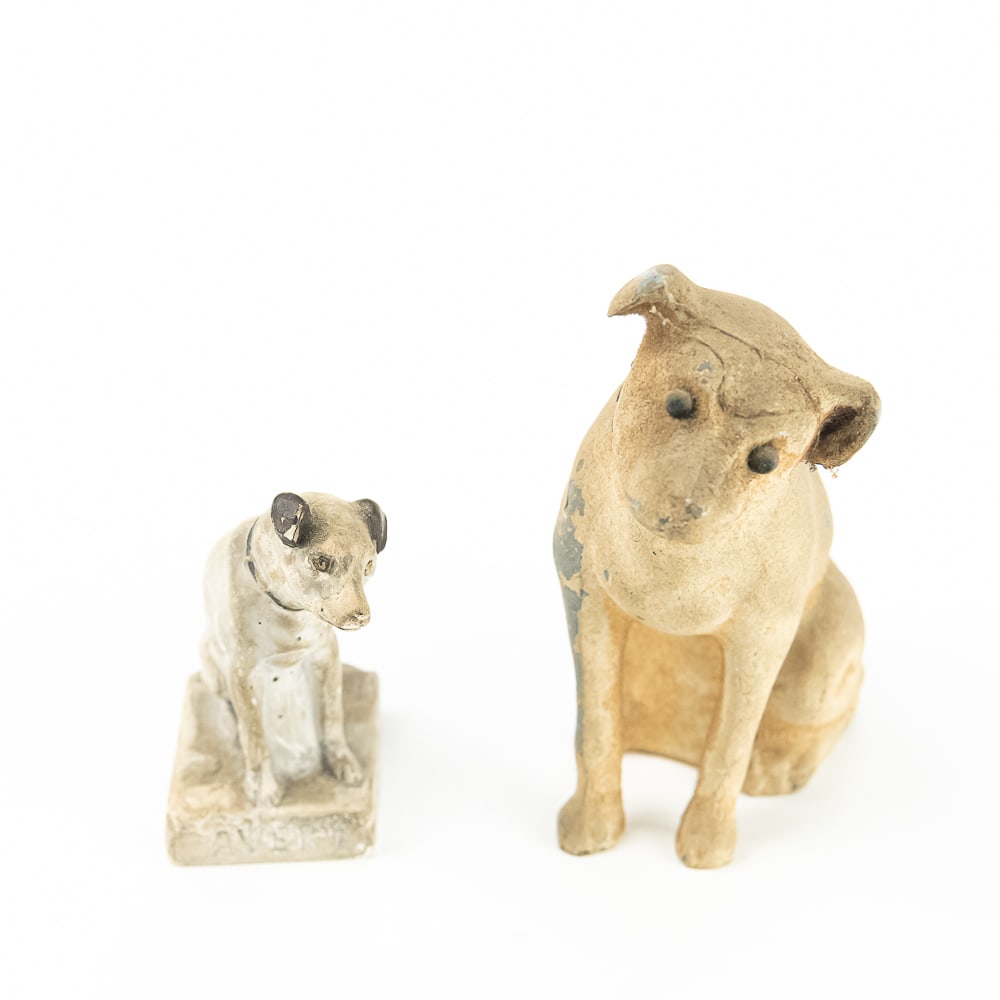 Vintage RCA Victor Nipper Statues (2 Pcs): This classic advertising lot features two distinct vintage representations of "Nipper," the iconic Fox Terrier mascot for RCA Victor, historically manufactured for the Radio Corporation of America.