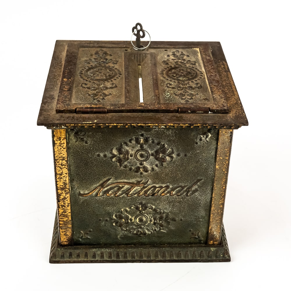 National Cast Iron Receipt Box: This turn-of-the-century cast iron counter-top coin drop box was manufactured by the renowned National Cash Register Co. (NCR) of Dayton, Ohio, to allow merchants to securely drop high-denomination cu