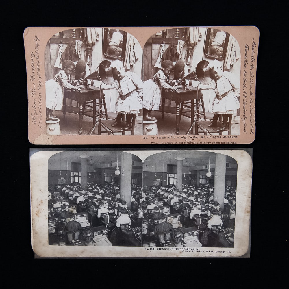 2 Vintage Stereo Views With Phonographs: Includes a comedy card of 3 black children listening to a Columbia Eagle phonograph and a card from the Sears set showing a room of secretaries transcribing letters from Dictaphones. Both in good cond