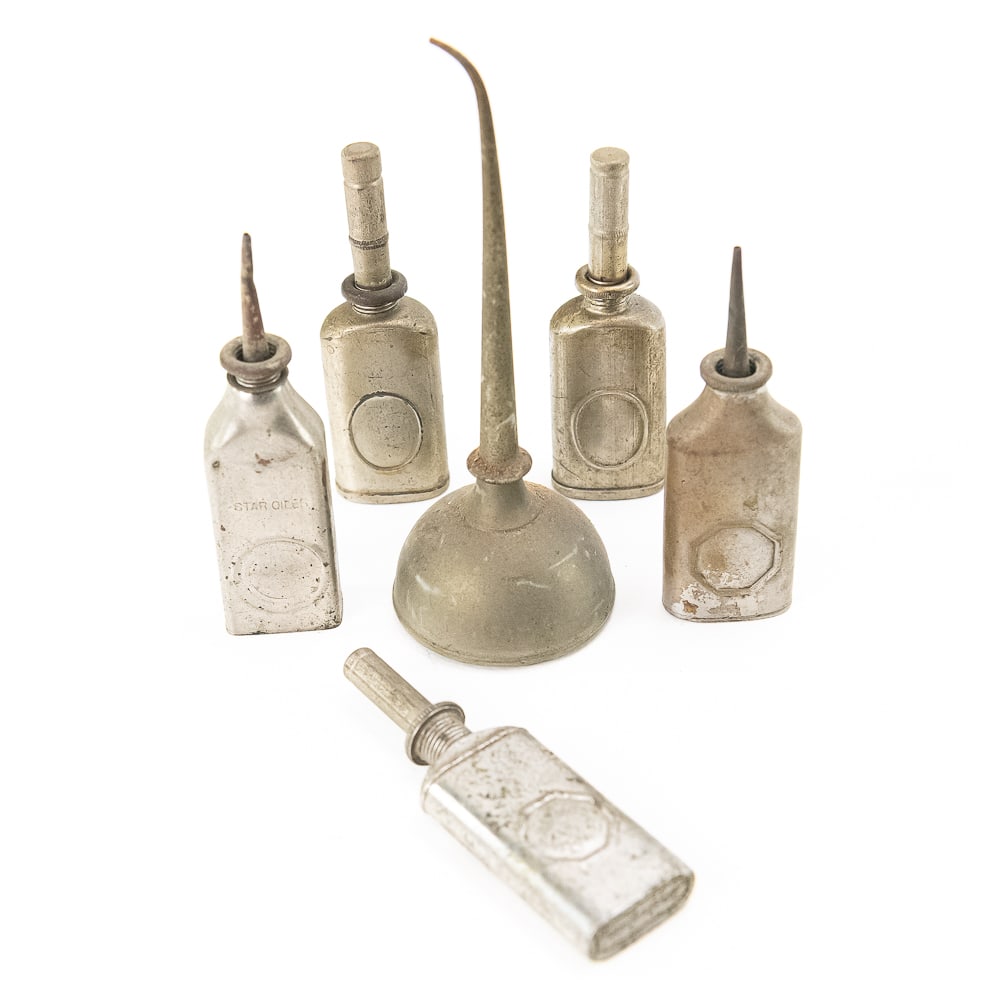 Six-Piece Lot of Oil Cans: Includes five small nickel-plated oil cans (three of which have caps) and one larger oil can, most likely from phonographs or sewing machines. In as-found condition. See photos for details. From the