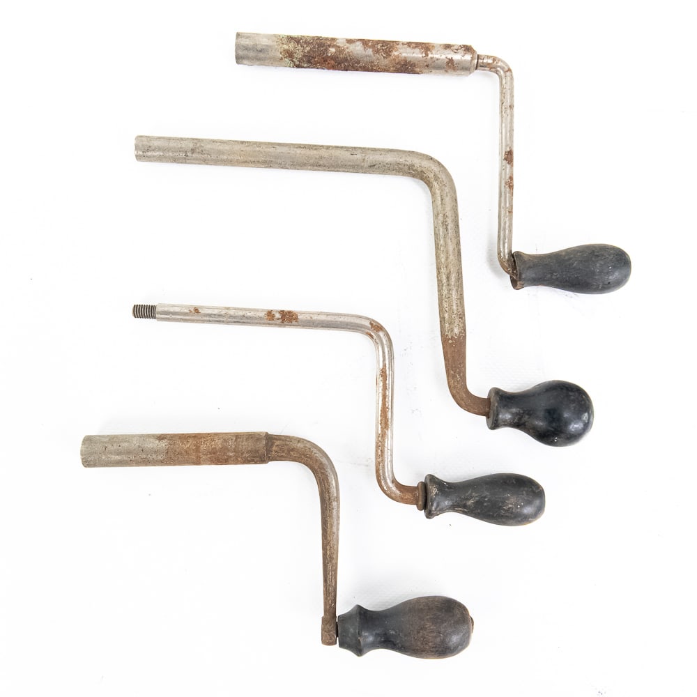 4 Piece Lot of Various Phonograph Cranks: Threaded disc phonograph cranks. One appears to be Columbia and three are off-brand, all of which have some rust and deterioration. See photographs. From the Allen Koenigsberg collection