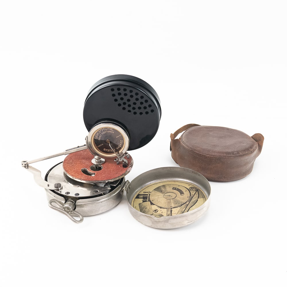 Mikiphone Pocket Disc Phonograph: The Mikiphone pocket disc phonograph is widely celebrated as the world's first pocket record player. Designed in 1924 by Hungarian brothers Miklós and Étienne Vadász, this mechanical
