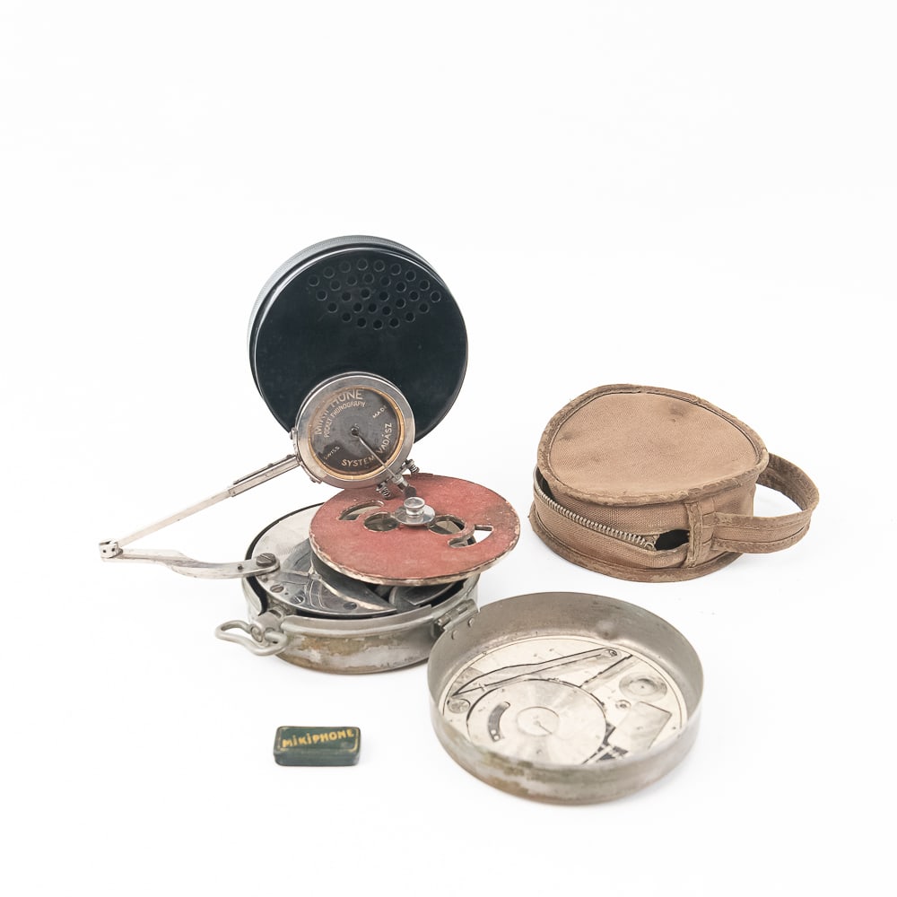 Mikiphone Pocket Disc Phonograph: The Mikiphone pocket disc phonograph is widely celebrated as the world's first pocket record player. Designed in 1924 by Hungarian brothers Miklós and Étienne Vadász, this mechanical