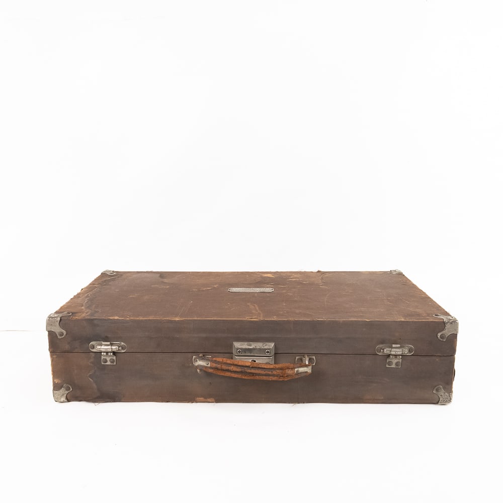 United States Phonograph Co Record Case: A wood with canvas cover cylinder record storage / carrying case in fair to good condition with tags on both sides reading Made exclusively by United States Phonograph Co. 87-91 Orange St. Newark,