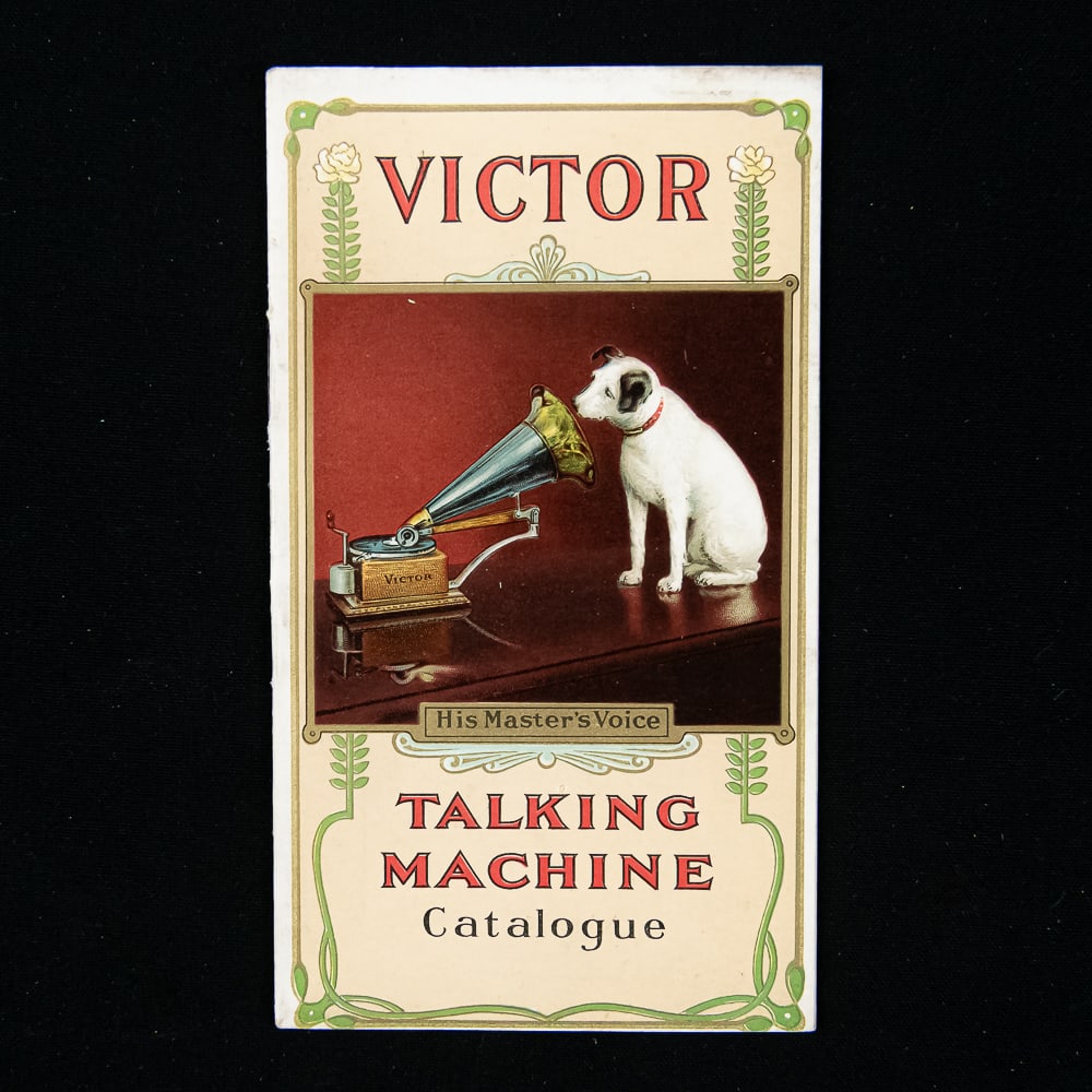 1904 Victor Talking Machine Catalogue: Original color cover vertical catalog of Victor phonographs featuring Victors I-VI, the Z, and the 3 Monarchs. In overall VG condition. Measures 6" tall, 3.5" wide. From the Allen Koenigsberg