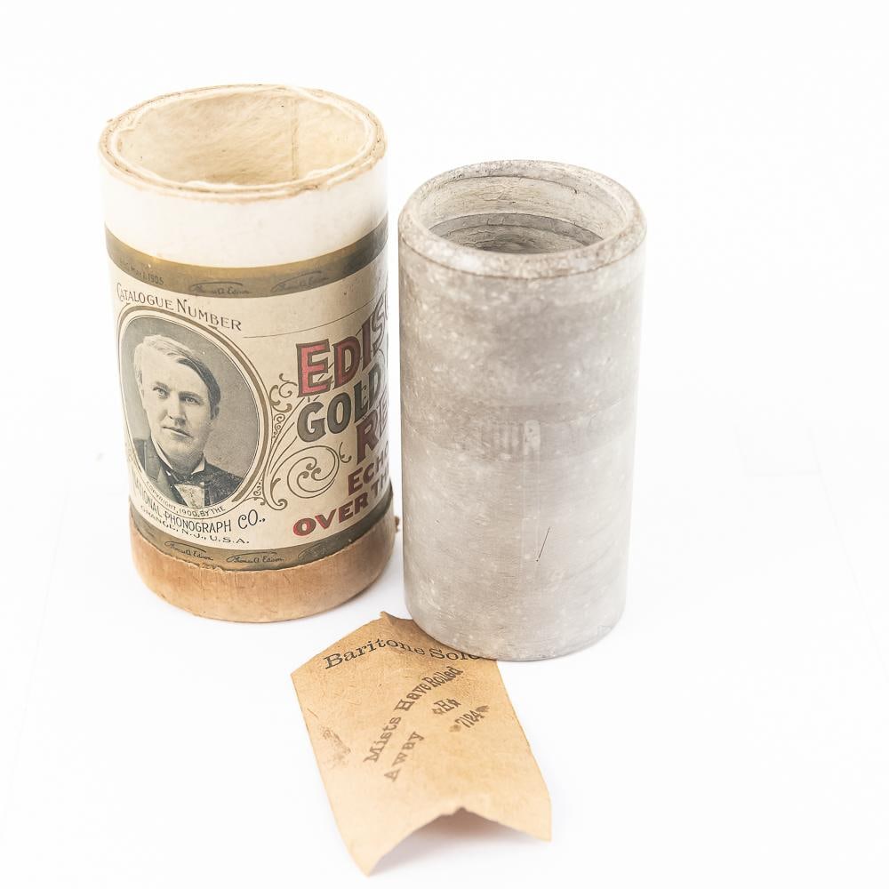 Columbia Brown Wax Cylinder Record 7124: Brown wax cylinder features the baritone solo "When The Mists Have Rolled Away" (catalog number 7124), generally attributed to early recording pioneer J.W. Myers and produced by the Columbia