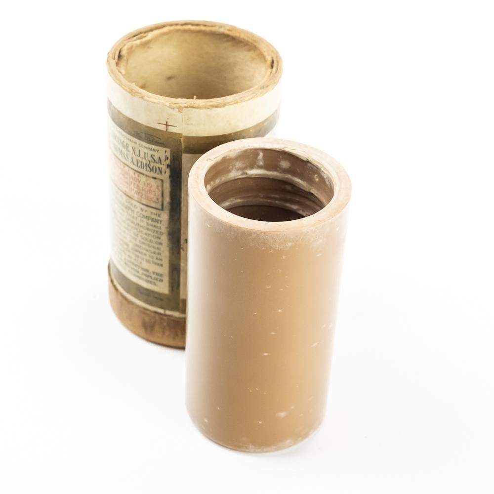 Columbia Brown Wax Cylinder Record 9038: Brown wax cylinder record made by Columbia titled, A Trip To The County Fair sung by The Greater New York Quartet circa 1897. Cylinder in VG condition with light spotting and a little haze at both end