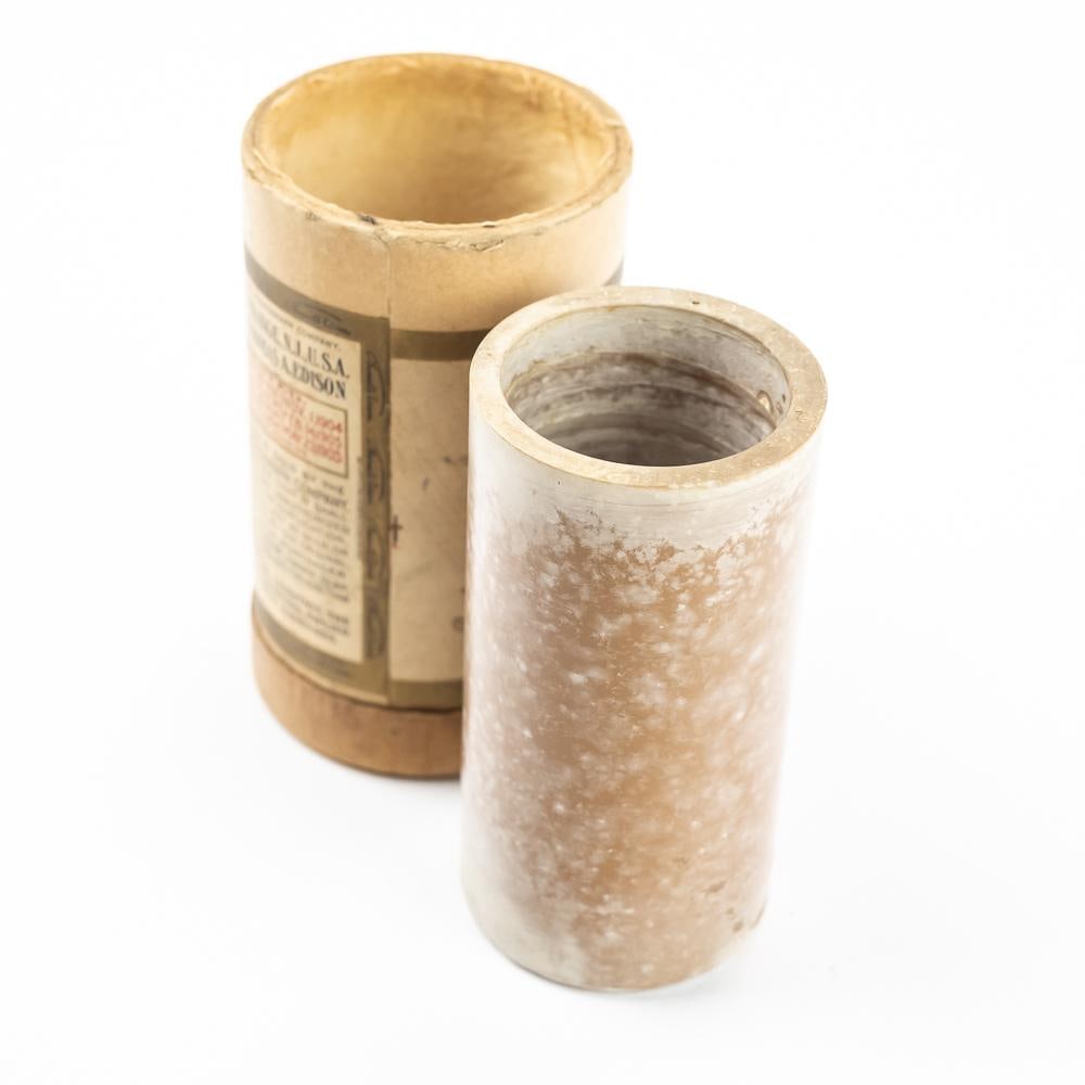 Columbia Brown Wax Cylinder Record 4048: Brown wax cylinder record made by Columbia titled, Dee Trumpet in Dee Cornfield Blows sung by George J. Gaskin. In overall fair to poor condition with chips and repairs on the lead end. Comes in incor