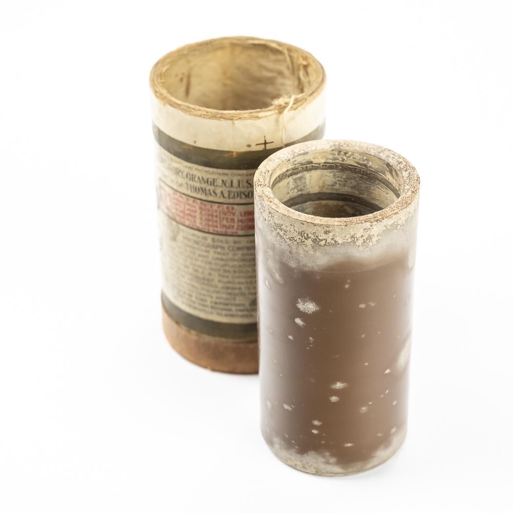 Columbia Brown Wax Cylinder Record 15171: Brown wax cylinder record made by Columbia titled, Medley of Popular Songs played by the Columbia Orchestra. Cylinder in poor condition with mold and haze. Comes with partial paper record slip in inco