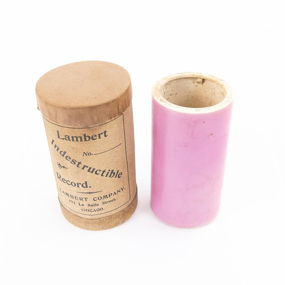 Pink Lambert Cylinder Record # 40: # 40 Dream of spring - Zither. Light pink color has some fading. Does not fit on mandrel. will need to be opened up a bit. Has original Lambert box and lid. From the Allen Koenigsberg collection.