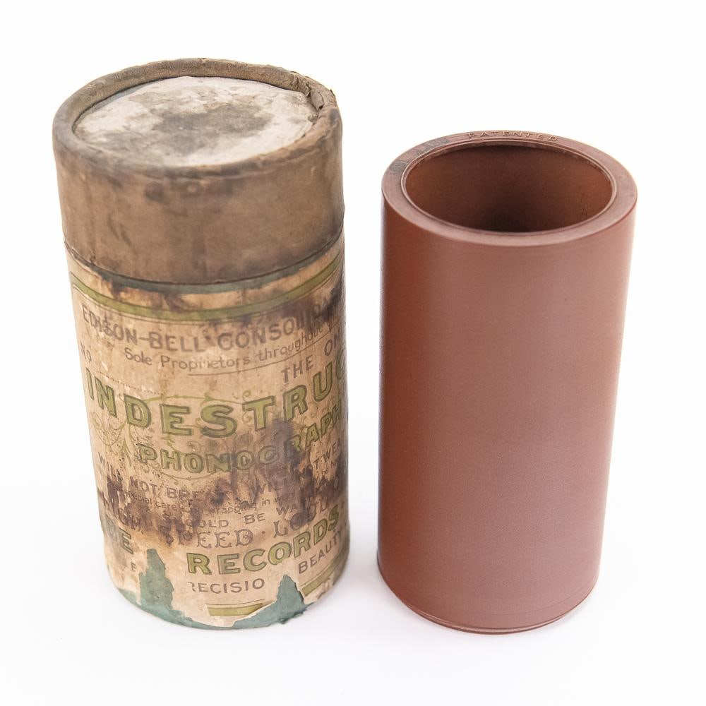 Edison Bell Lambert Cylinder Record # 5681: # 5681 Class. Nice chocolate brown color. Barely fits on end of mandrel. Marked Edison Bell Indestructible Record on lead edge. While Thomas Edison's American company famously resisted using celluloid