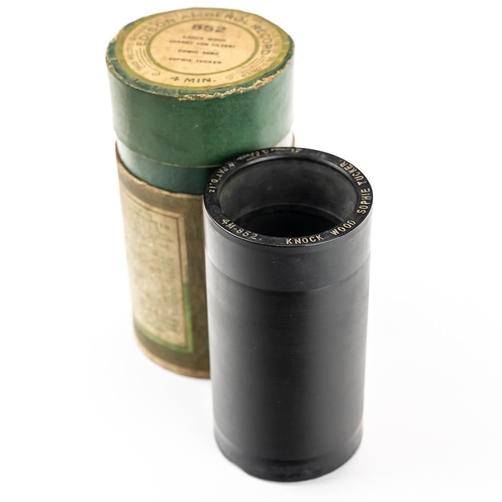 Sophie Tucker Cylinder Record No. 852: Sophie Tucker black wax Edison Amberol 4 minute cylinder record No.852 Knock Wood in original box with correct titled lid. In overall VG condition with no cracks or scratches and a small chip on the l