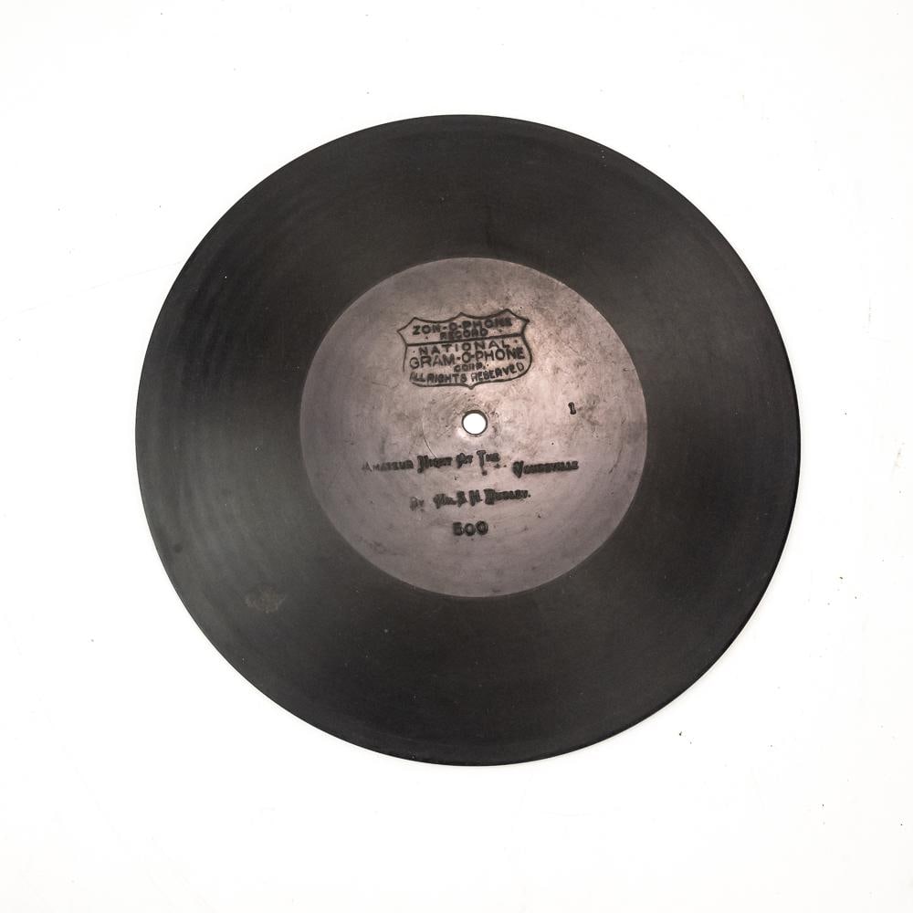 Zon-O-Phone Disc Record: 9" Zon-O-Phone disc record #500. Amateur Night at the Vaudville, By Mr. S.H. Dudley. In good+ condition with either a pressing flaw or possibly something gummy at the 8 o'clock position. See photos.
