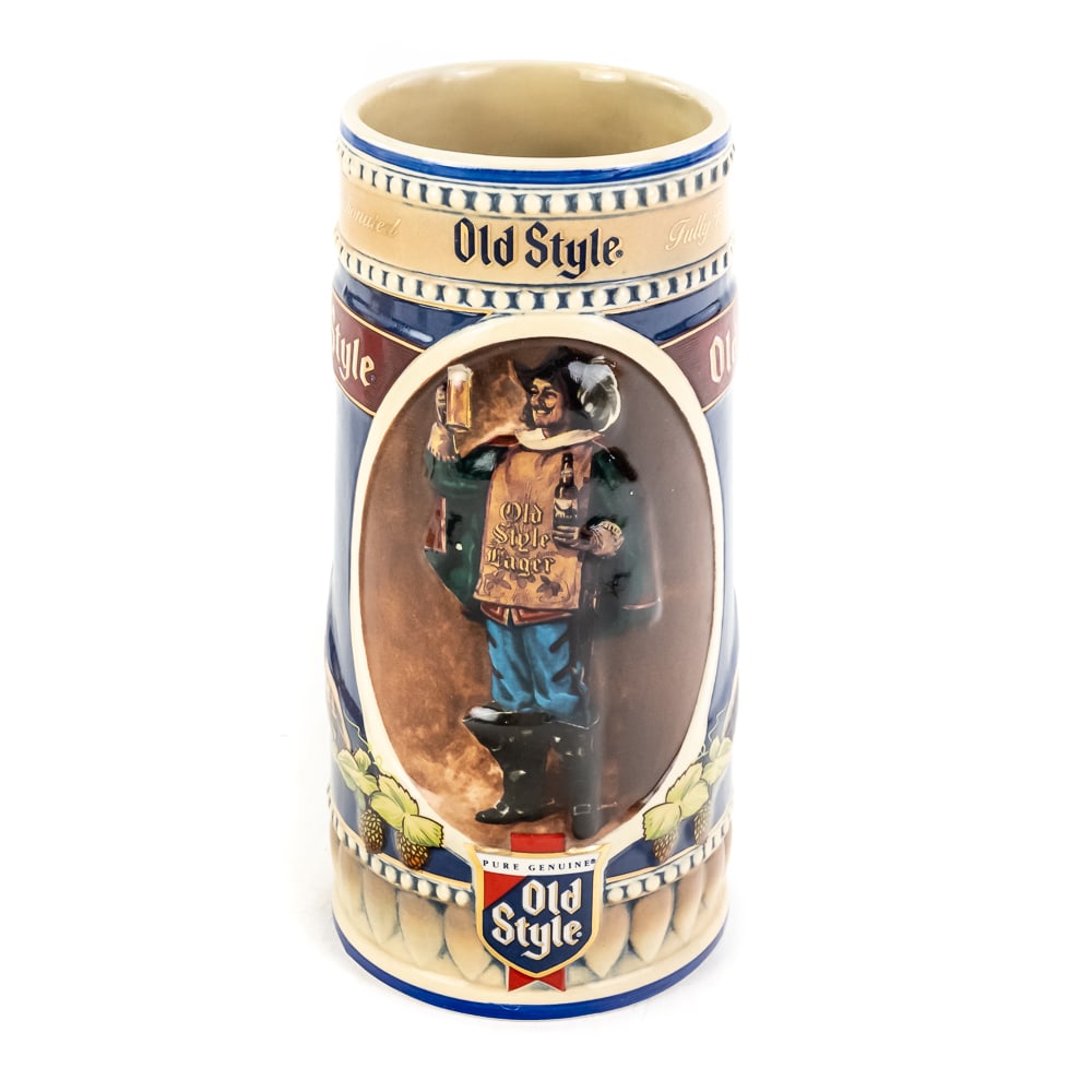 1990 Limited Edition Old Style Beer Stein: 1990 Limited Edition Old Style Beer Stein, #00854, ceramic mug features raised relief scene of the "Old Style Cavalier" accented with hops and barley, in original box, see photos. 7 3/4" tall