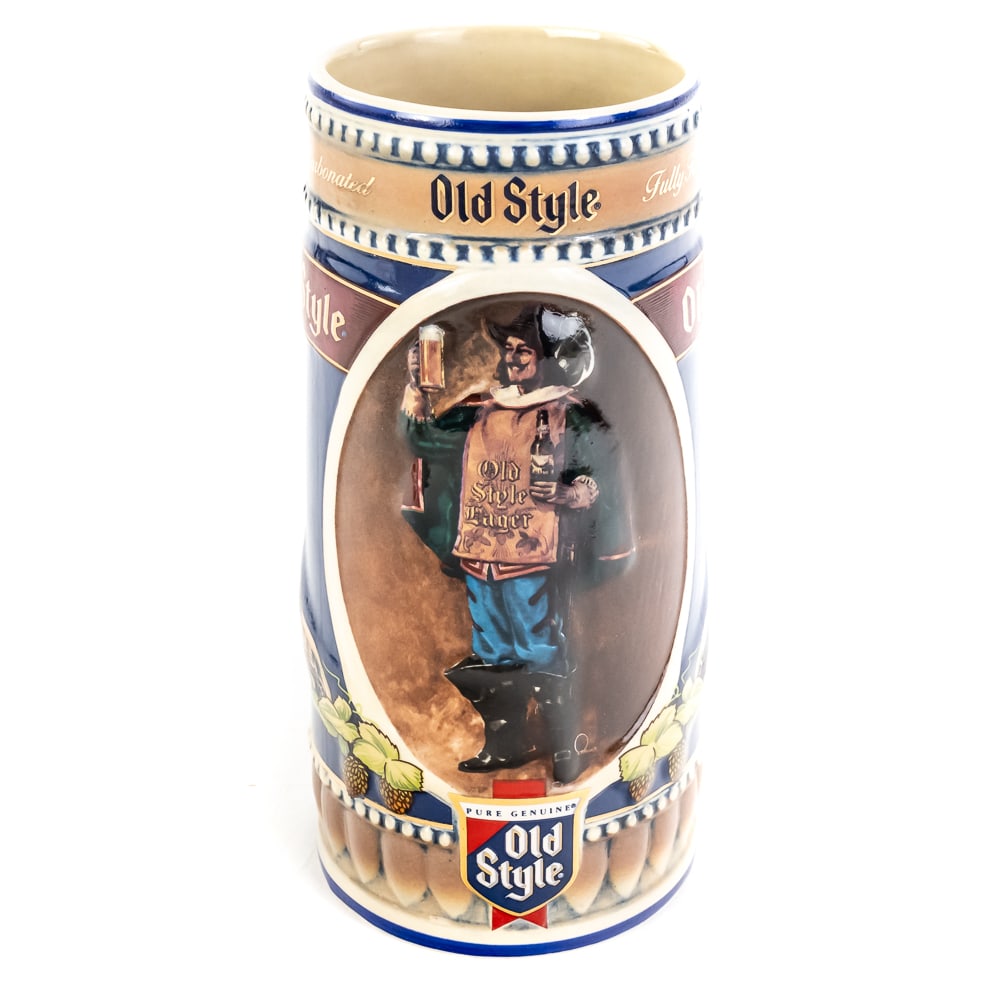 1990 Limited Edition Old Style Beer Stein: 1990 Limited Edition Old Style Beer Stein, #1033000854, ceramic mug features raised relief scene of the "Old Style Cavalier" accented with hops and barley, in original box, see photos. 7 3/4" tall