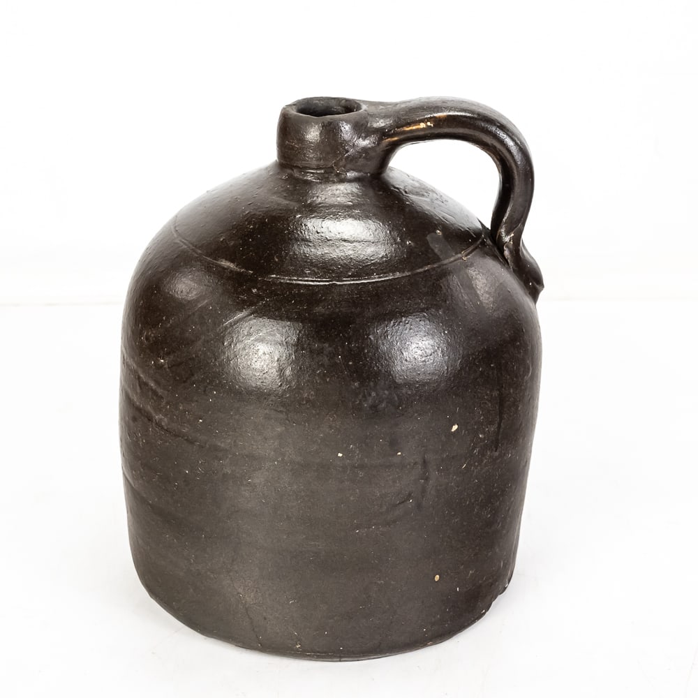 Antique "Beehive" Stoneware Jug 9": Antique "Beehive" Jug, stoneware with deep brown salt glaze, short pouring spout and a thick, hand-attached loop handle, used for everyday liquid provisions, age-related wear, no cracks, minor chips,