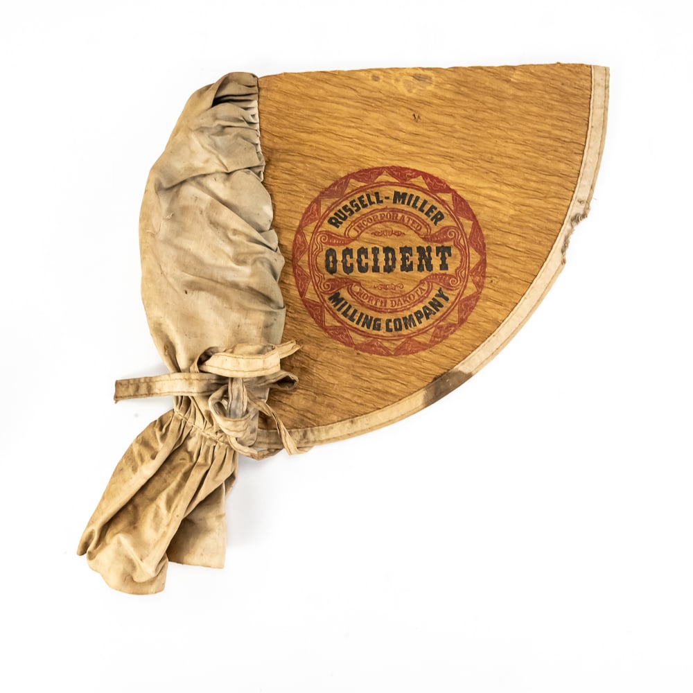 Vintage Sunbonnet Occident Flour: Vintage Sunbonnet Occident Flour, repurposed flour sack features the prominent red and yellow logo of the Russell-Miller Milling Company, established in 1882 in Valley City, ND, during the Great Depre