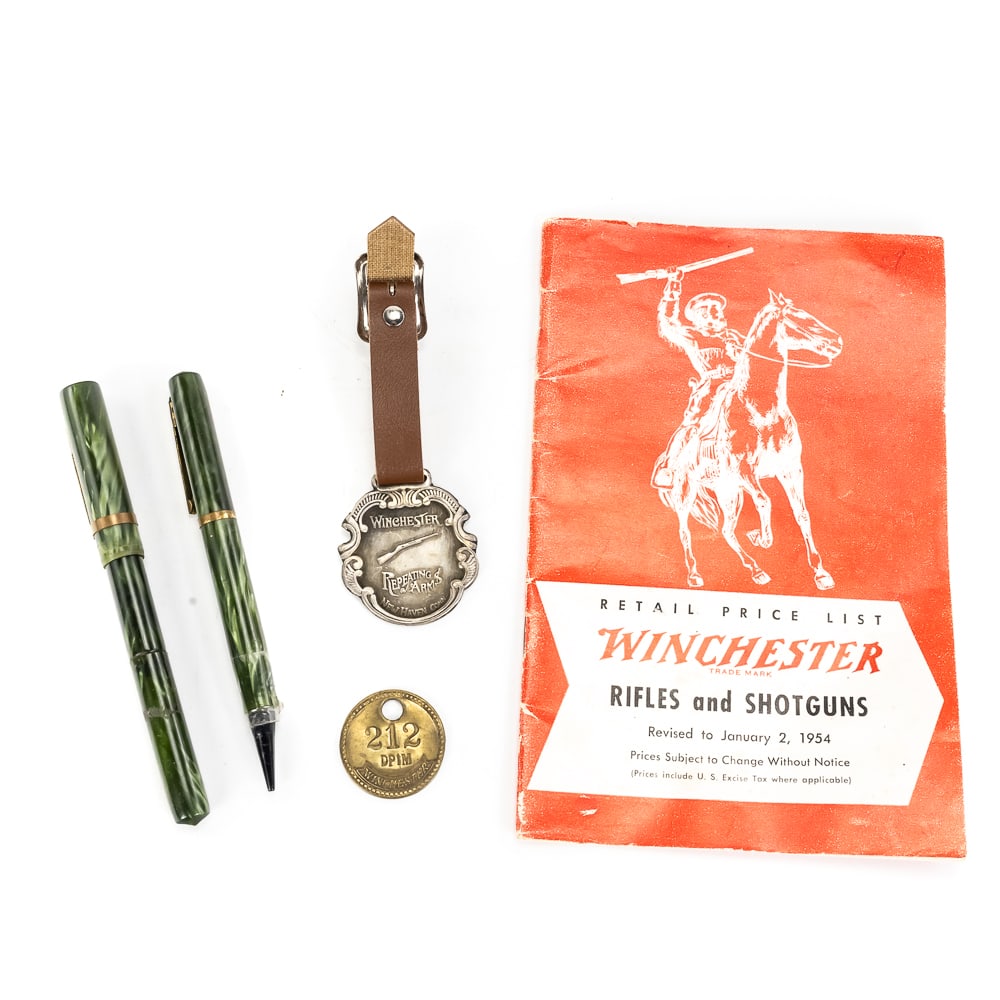 (5) Winchester Collector Products: Winchester Collector Products includes a brass Winchester numbered token, likely used as a company scrip or a colliery check tag in the mining industry, a vintage-style Winchester Repeating Arms