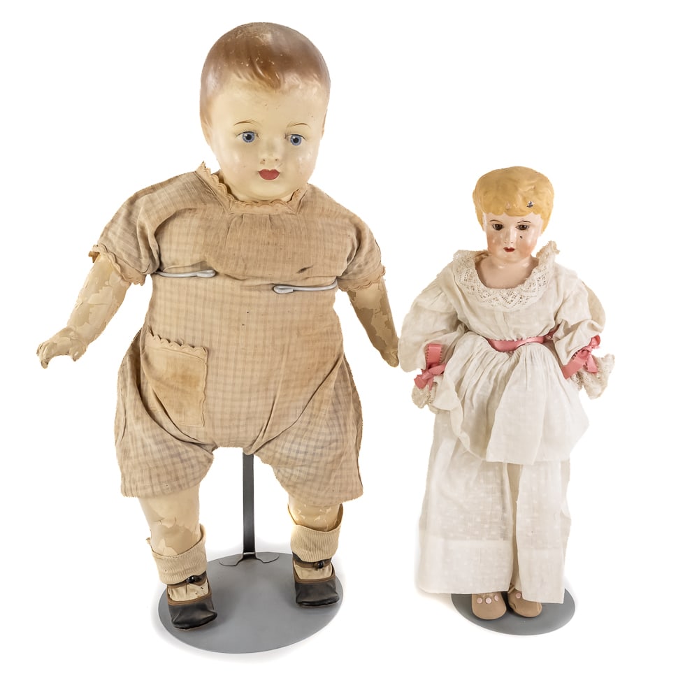 Antique German Bisque-Head Doll & Baby Doll: Antique German Bisque-Head Doll & Baby Doll, late 19th century painted bisque porcelain with molded blonde hair, painted eyes, mouth, cheeks and hair, period dress, combination of a molded head on a
