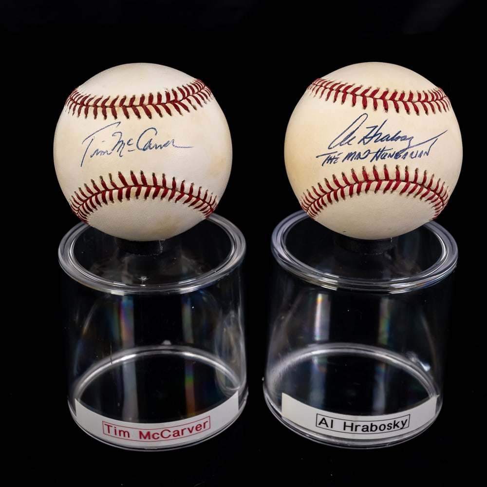 Al Hrabosky & Tim McCarver Autographed Baseballs: St Louis Cardinal fan favorite announcers Al Hrabosky & Tim McCarver autographed Rawlings Official AL & NL MLB Baseballs. Attractive Bold Blue ink signatures !!! Showcased inside handsome acrylic