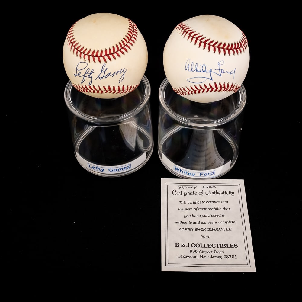 Lefty Gomez & Whitey Ford Autographed AL Baseballs: New York Yankee fan favorites Lefty Gomez & Whitey Ford (COA) autographed Rawlings Official American League MLB Baseballs. Attractive Bold Blue sweet spot ink signatures !!! Showcased inside handsome 