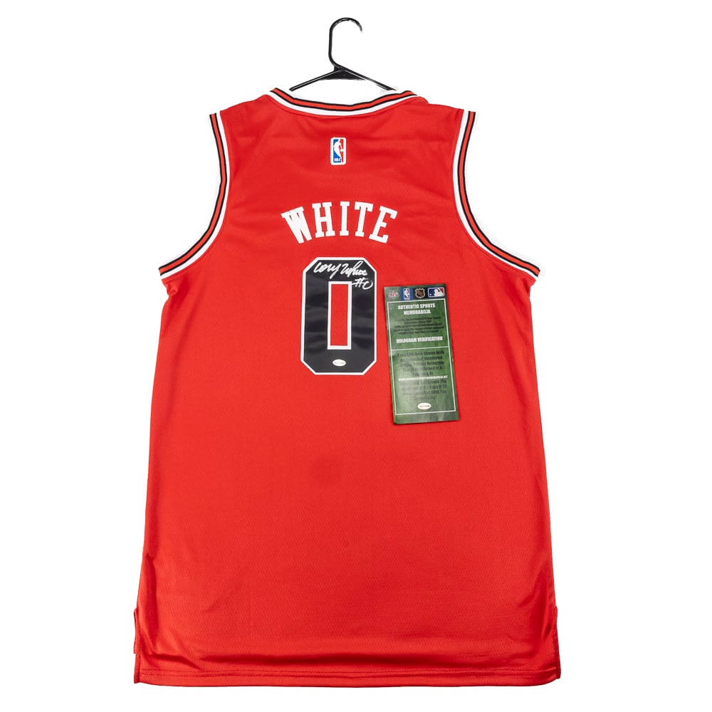 Coby White Autographed Bulls Nike Jersey w COA: Coby White autographed NWT Chicago Bulls Nike Swingman Jersey featuring Authentic Sports Memorabilia Authentication COA. Bold silver felt tipped signature. Ready to be framed up!! Perfect addition to 
