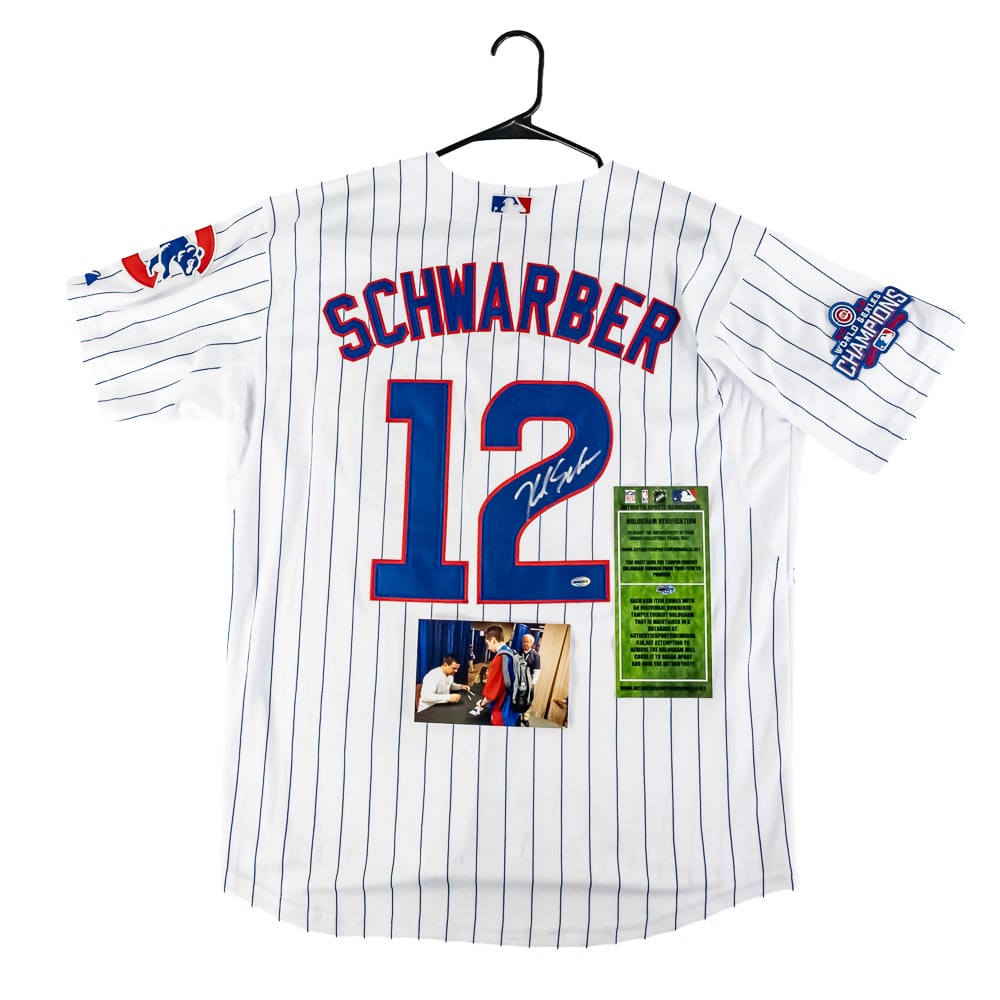 Kyle Schwarber Autographed '16 Cubs WS Jersey COA: Kyle Schwarber autographed white Majestic Chicago Cubs 2016 World Series Jersey featuring Authentic Sports Memorabilia Authentication COA. Bold centralized silver felt tipped signature. Ready to be fr