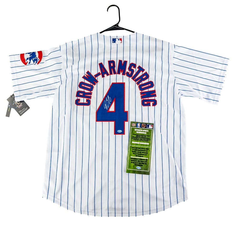 Pete Crow Armstrong Autographed Cubs Jersey w COA: Pete Crow Armstrong (PCA) autographed Chicago Cubs white pinstripe Majestic jersey featuring Authentic Sports Memorabilia Authentication COA. Bold centralized silver felt tipped signature. Ready to be