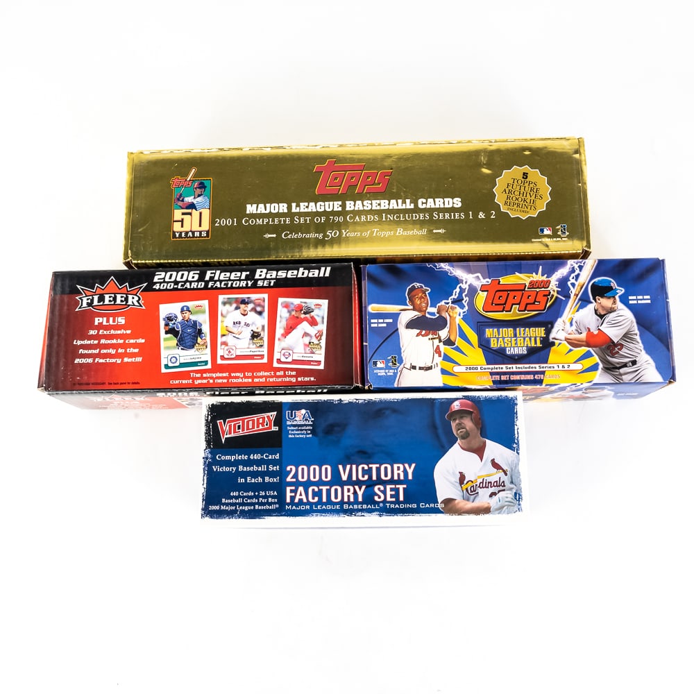 '00 Victory 00 Topps '01 Topps & 06 Fleer MLB Sets: Collection featuring 2000 Victory, 2000 Topps (1&2), 2001 Topps (1&2) & 2006 Fleer MLB Baseball complete factory sets showcased inside original packaging. Appears complete. Lots of Fun !!! Perfect