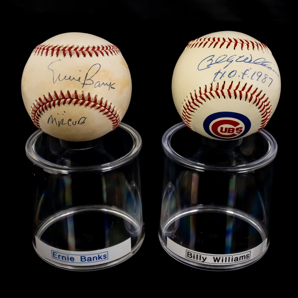 Ernie Banks & Billy Williams Autographed Baseballs: Chicago Cubs Hall of Fame inductees and fan favorite Ernie Banks (w MR CUB inscription Rawlings NL ball) & Billy Williams (with HOF 1987 inscription in vintage Cubs branded ball) autographed