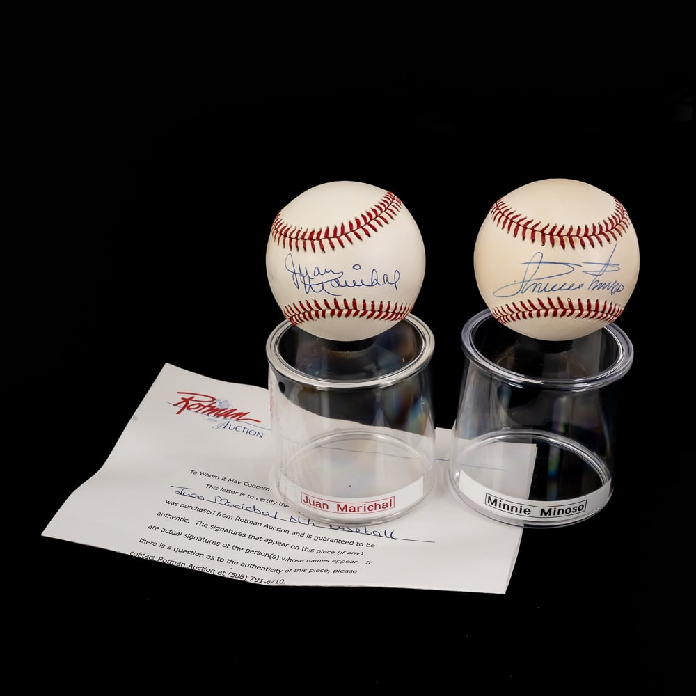 Minnie Minoso & Juan Marichal AUTOGRAPHED Baseball: Minnie Minoso & Juan Marichal (LOA) autographed Rawlings Official American & National League MLB Baseballs. Bold Blue ink signatures smack dab in the sweet spots !!! Showcased inside handsome acrylic