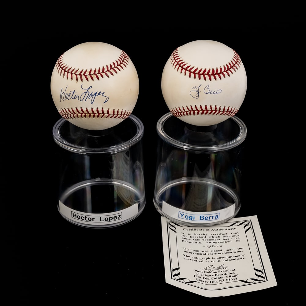 NYY Yogi Berra COA & Hector Lopez Signed Baseballs: New York Yankee All Time Great Yogi Berra autographed Rawlings Official American League Baseball with Score Board Paul Goldin COA and an additional Yankee favorite Hector Lopez autographed Official Am
