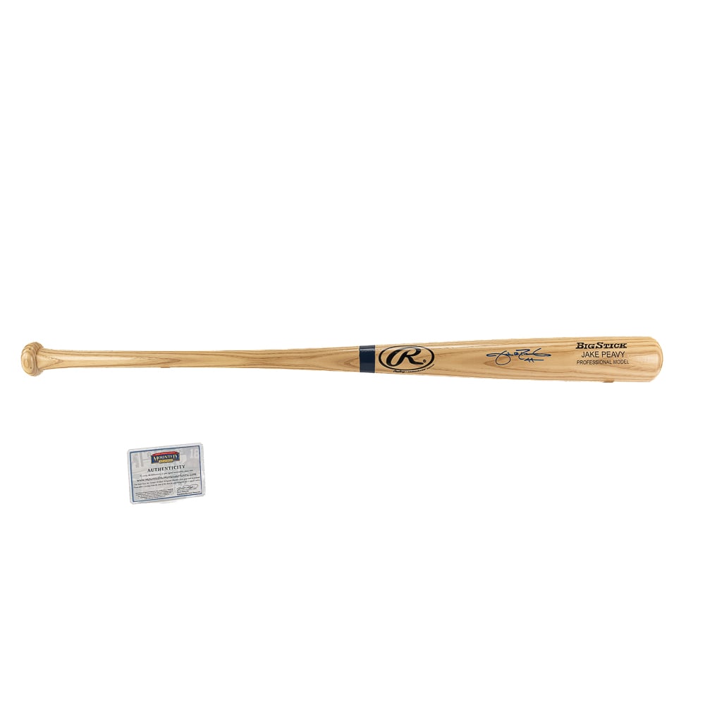 Jake Peavy Autographed Rawlings Baseball Bat COA: Jake Peavy autographed Rawlings Big Stick Professional Model baseball bat featuring Mounted Memories COA . Bold centralized blue felt tipped signature perfectly accents the bats barrel. Perfect additi