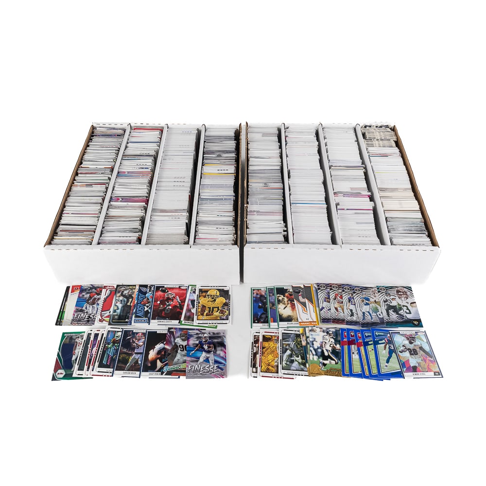 (6000) NFL Football Sports Card Assortment: NFL Football sports card assortment composing (6000 +/-) between (2) 4 row storage boxes. Commons, Refractors, Rookies, ALL Star & HOF some Retro & Insert cards etc in Mint overall condition. Exactly 