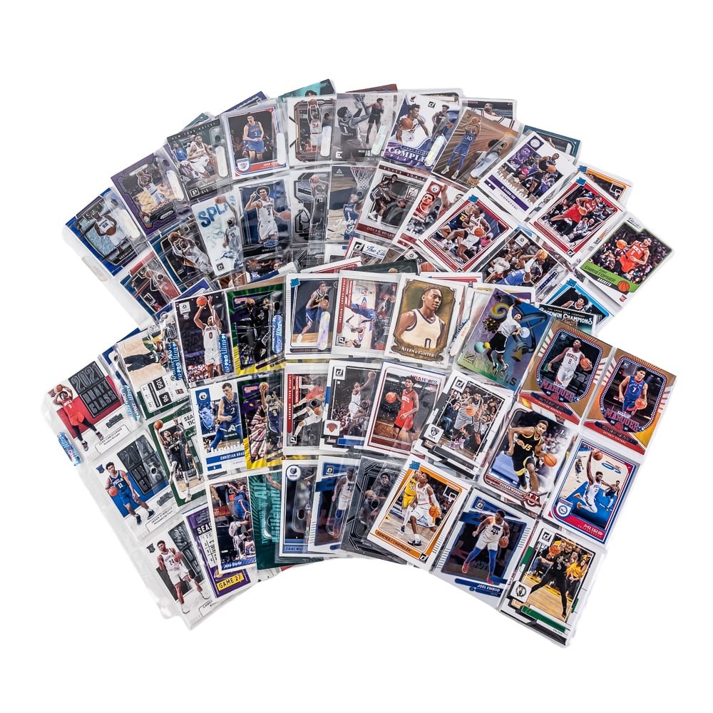 (153) NBA Refractor Rookie & More Card Assortment: NBA sports card assortment including many tough to locate cards, Refractors, Rookies, ALL Star & HOF including (17) clean binder sheets full both sides with (153) Refractors, Rookie Cards some Retro I