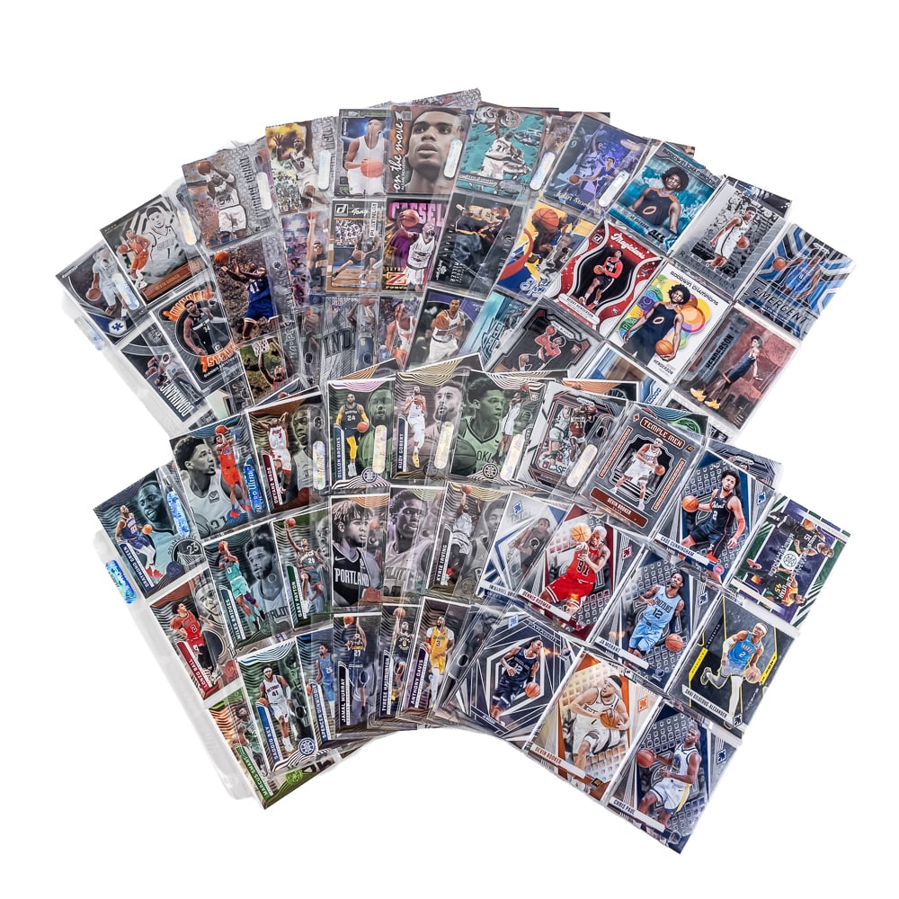(153) NBA Refractor Rookie & More Card Assortment: NBA sports card assortment including many tough to locate cards, Refractors, Rookies, ALL Star & HOF including (17) clean binder sheets full both sides with (153) Refractors, Rookie Cards some Retro I