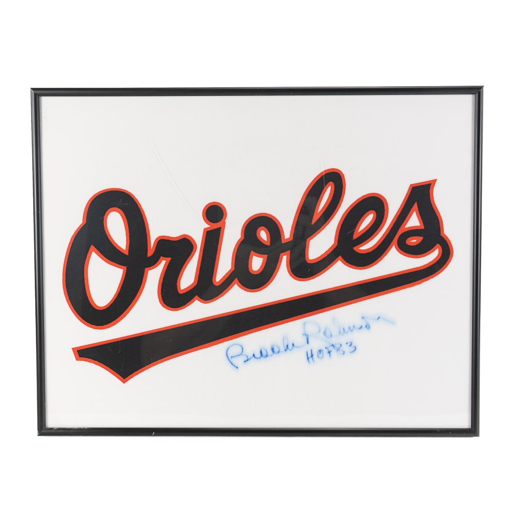 Brooks Robinson Autographed Framed Mini Jersey COA: Brooks Robinson "HOF83" Autographed & Inscribed framed (14.5"t x 18.5"l) Baltimore Orioles mini jersey with COA. Bold blue felt tipped signature with some fading;perfect addition to any home or