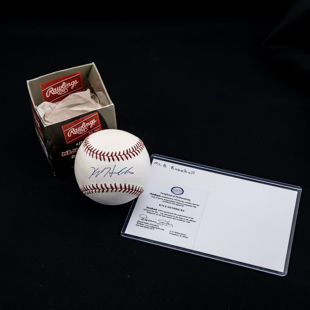 Kyle Hendricks Autographed Rawlings Baseball w COA: Kyle Hendricks Autographed Rawlings Official MLB Baseball with Sids Graphics COA. Presents perfectly featuring handsome sweet spot ball point ink signature and in excellent overall condition with orig