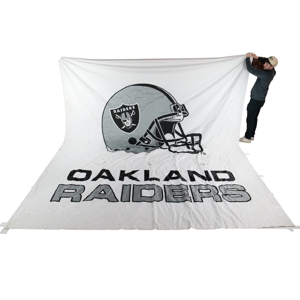 Large Oakland Raiders Stadium Banner: Large and in charge Oakland Raiders Stadium banner with a size of Hung from the Oakland Coliseum most likely pre 2002 and in very good overall condition with minimal age and wear related