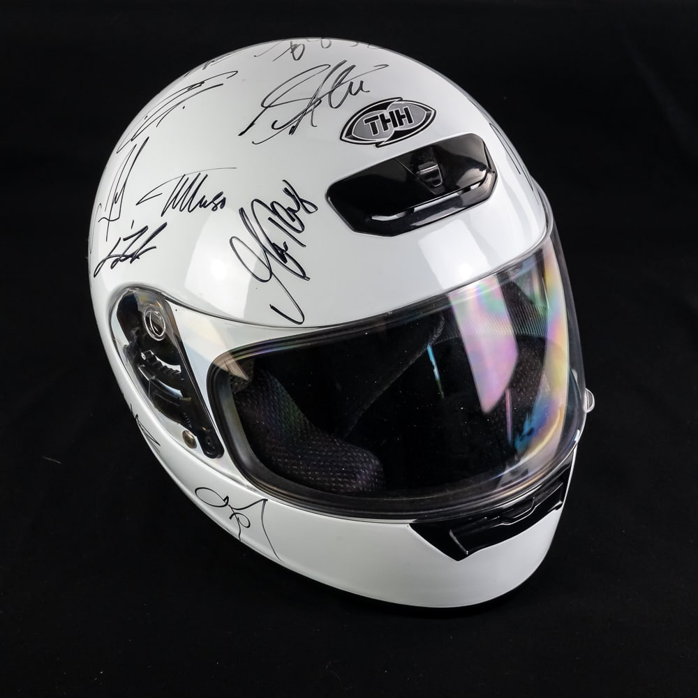 Multi Autographed F1 Racing THH Helmet Schumacher+: Attractive THH full size 1:1 scale plain white racing helmet perfectly accented with (21) black felt-tipped signatures featuring a centered Mick Schumacher, Lewis Hamilton, Max Verstappen, Sebastian V