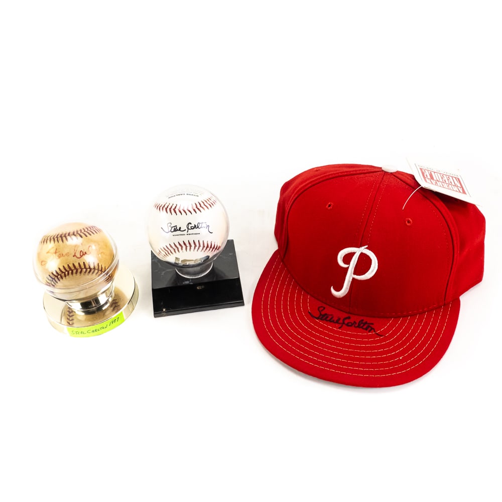 Steve Carlton Autographed Baseball & Phillies Hat: New with tags Steve Carlton AUTOGRAPHED Philadelphia Phillies Cooperstown fitted hat 7 5/8. Featuring an attractive, bold black felt-tipped signature on the hats bill; pristine - new with tags. Along