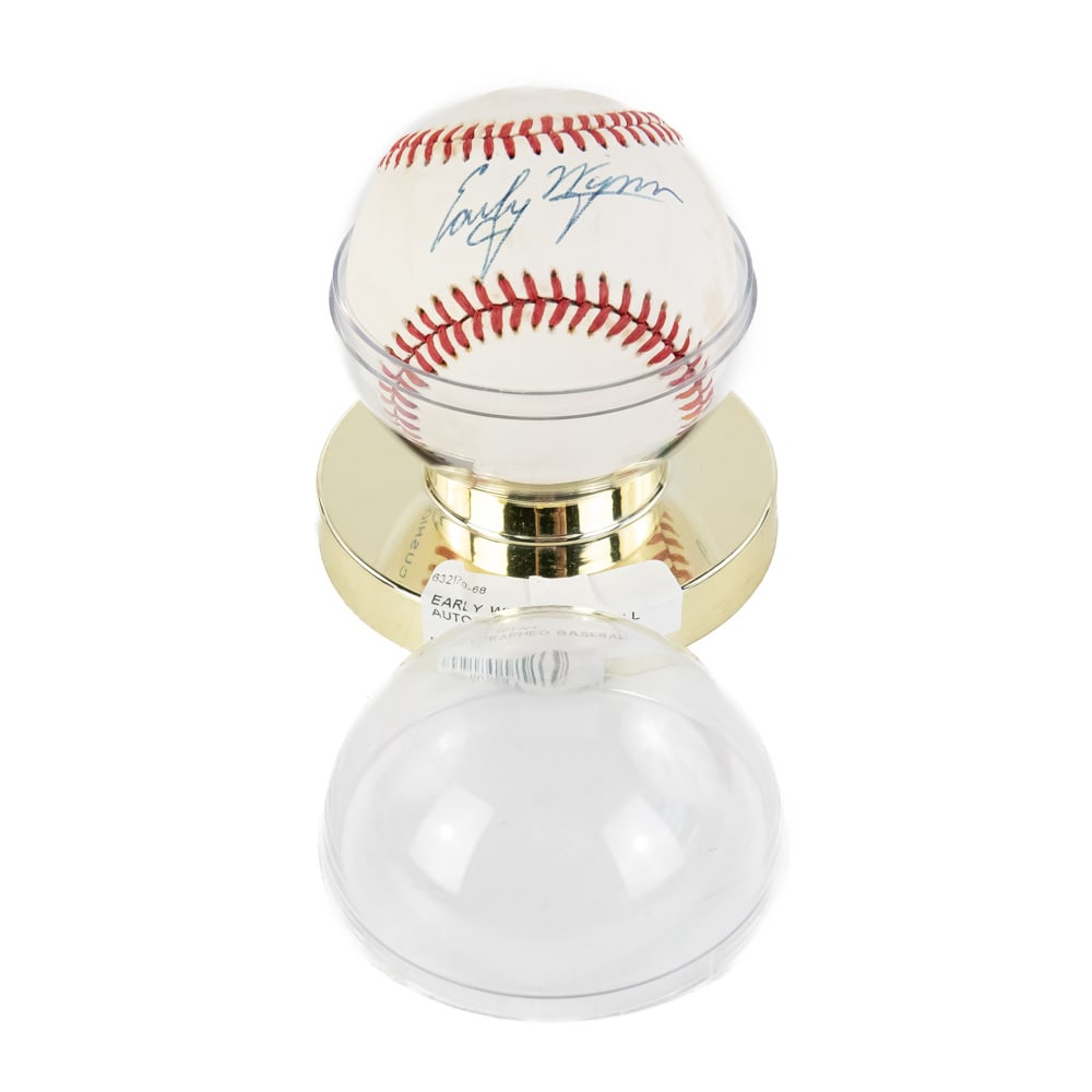 Early Wynn Autographed Rawlings AL Baseball: 9 time All Star, 1959 Cy Young Award Recipient & Hall of Fame inductee Early Wynn Autographed Rawlings Official American League Bobby Brown baseball; perfectly accented with bold blue ball ink Sweet