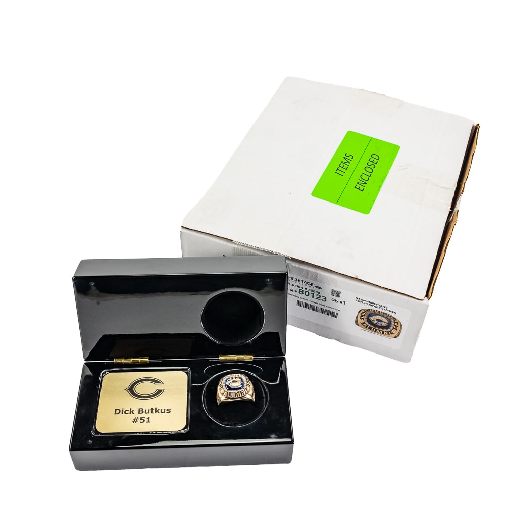 Dick Butkus – Chicago Bear Alumni Ring: Title: Dick Butkus Chicago Bear Alumni RingRing Material: 10 karat goldRing Size: 12.25 measurementRing Weight: 32 grams (championship ring weight)Stones: Ring top includes 27 select high clarity